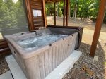 Hot tub on the lower level right outside the basement den 